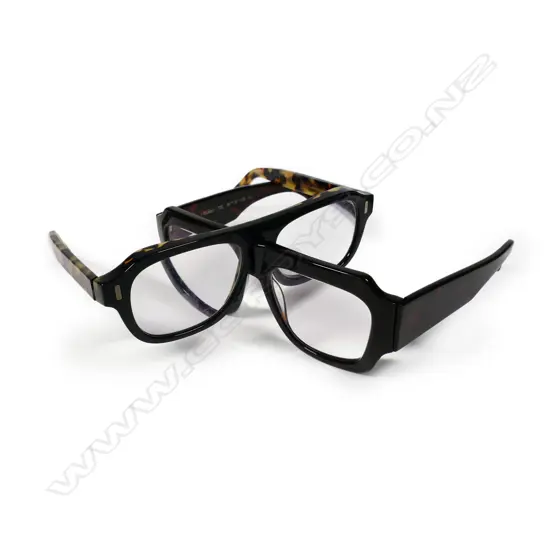 Two pairs of men's designer glasses: Cutler and Gross & 'Gustav' Isson,